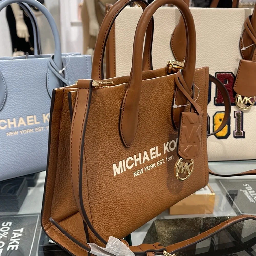 MICHAEL KORS Mirella Sm Shopper TZ XBody Pebbled Leather Crossbody
Luggage
NWT - Picture 3 of 16